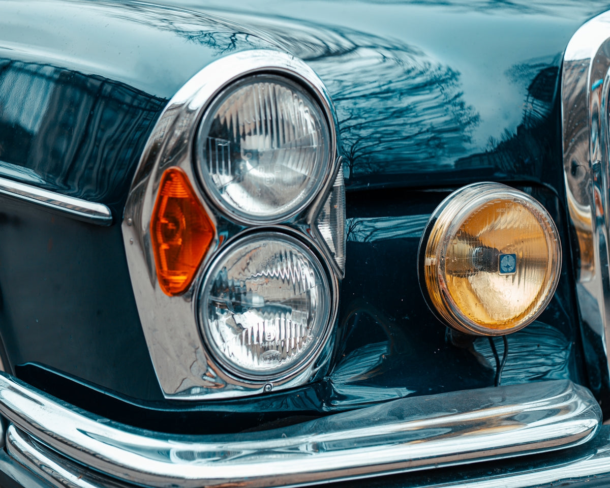 a close up of the headlights of a car