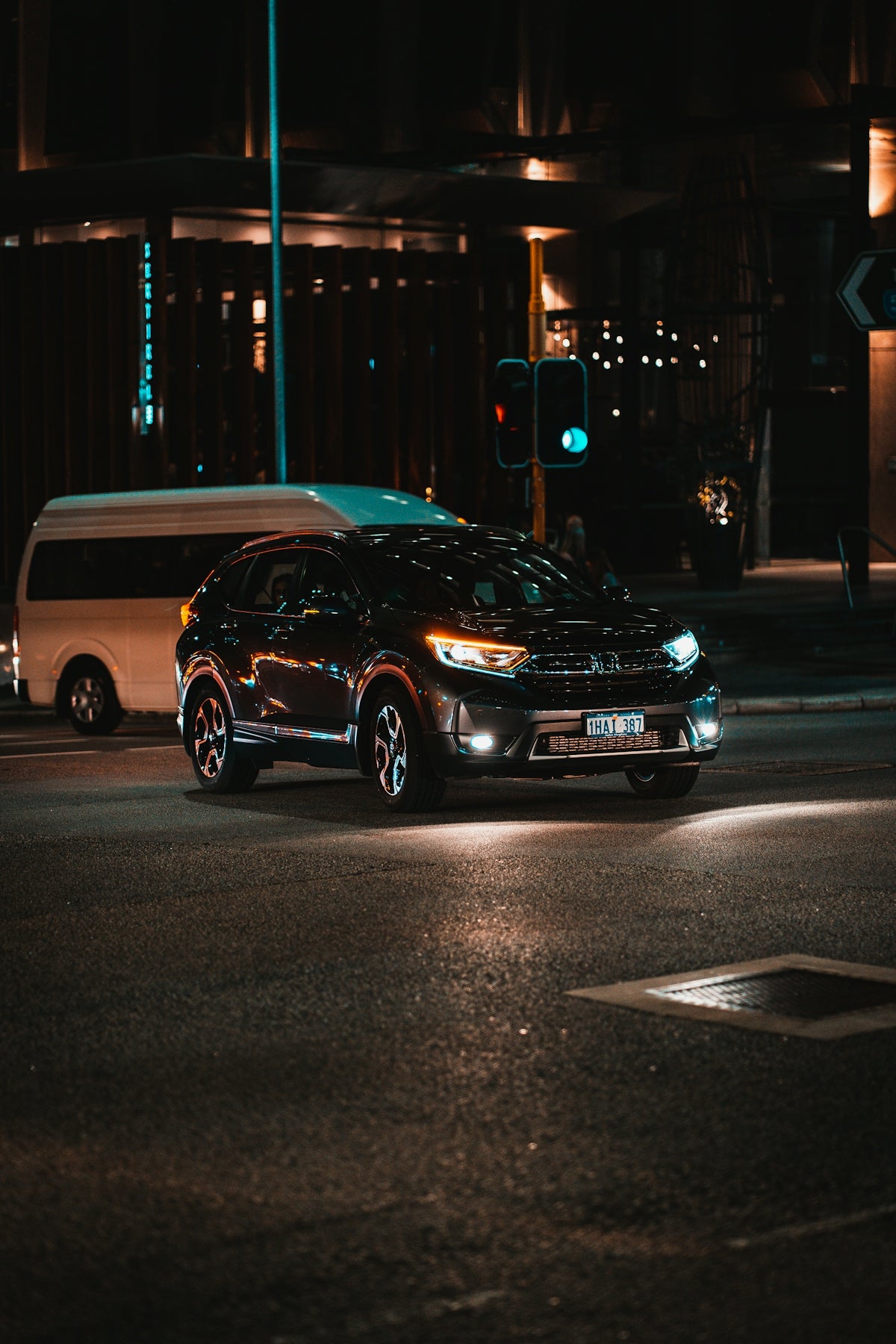 black bmw x 6 on road during night time