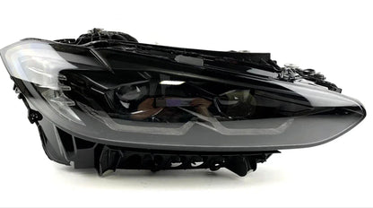 Reconditioned BMW 4 Series G22 LED headlight unit, black housing, clear lens